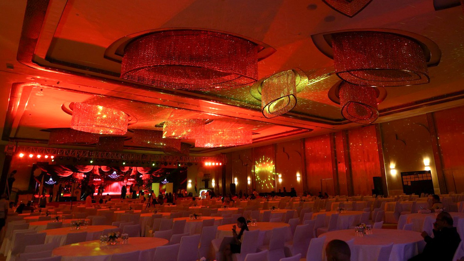 Corporate gala room transformed with red event lighting